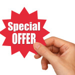 young female hand holding a special offer star